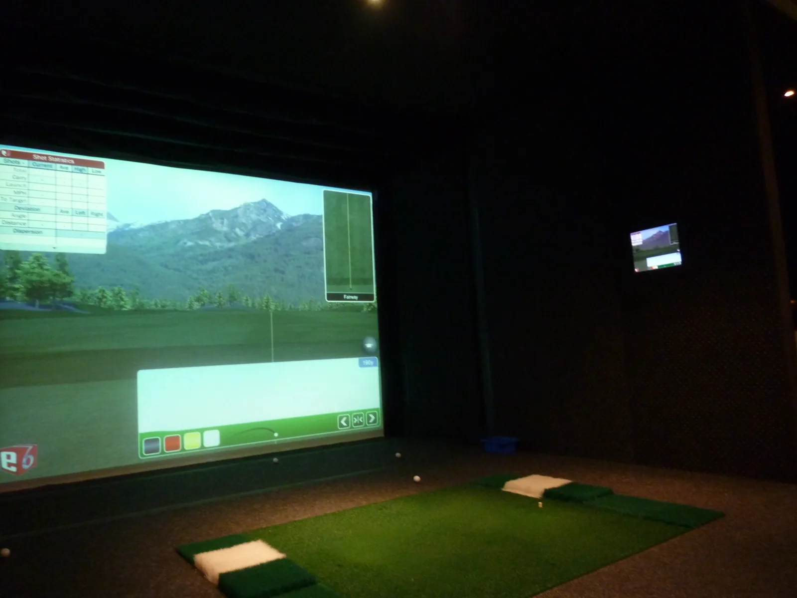 An indoor golf simulator photographed in July 2011. Illustrative archive image, not the TGL SoFi Center.