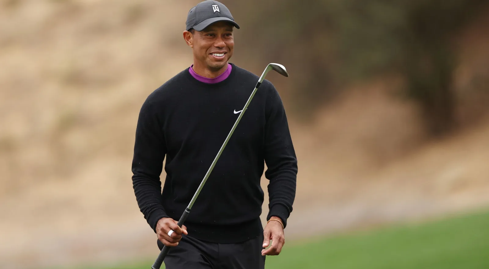 Tiger Woods playing golf at the 2020 PNC Championship, archive photograph.